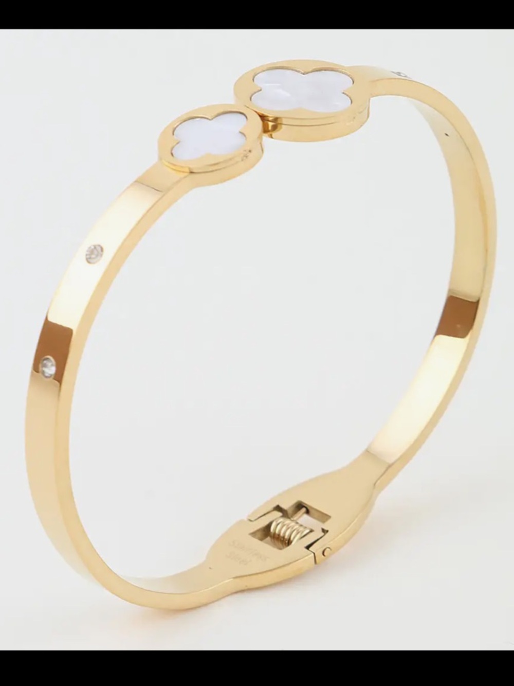 ShopEvelynne Gold and White Clover Accent Bangle Bracelet